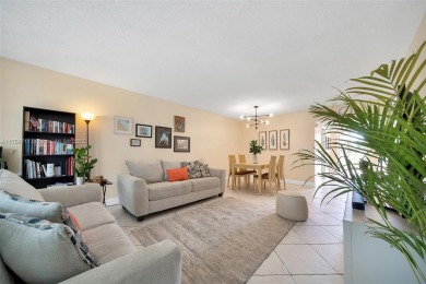Welcome to Residence 202 at Oaks Lane. You'll feel lighter than on Palm-Aire Country Club and Resort - Palms in Florida - for sale on GolfHomes.com, golf home, golf lot