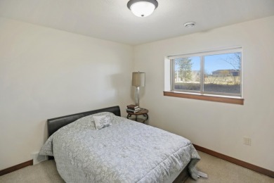 Welcome to 504 West Palmer Circle--an inviting home nestled on Rolling Hills Golf Club in South Dakota - for sale on GolfHomes.com, golf home, golf lot