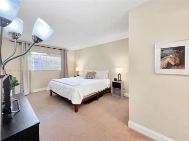 Welcome to Residence 202 at Oaks Lane. You'll feel lighter than on Palm-Aire Country Club and Resort - Palms in Florida - for sale on GolfHomes.com, golf home, golf lot