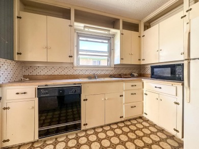 Welcome to your dream home at 1705 Takewell! This charming on Phillips Country Club in Texas - for sale on GolfHomes.com, golf home, golf lot