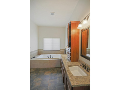Welcome to 504 West Palmer Circle--an inviting home nestled on Rolling Hills Golf Club in South Dakota - for sale on GolfHomes.com, golf home, golf lot