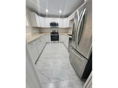 Come home to this immaculate, fully renovated 3-bedroom, 2-bath on Oaks Country Club in Florida - for sale on GolfHomes.com, golf home, golf lot