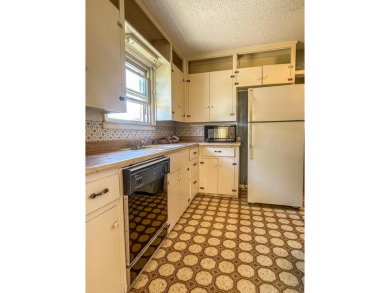 Welcome to your dream home at 1705 Takewell! This charming on Phillips Country Club in Texas - for sale on GolfHomes.com, golf home, golf lot