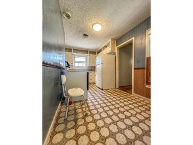 Welcome to your dream home at 1705 Takewell! This charming on Phillips Country Club in Texas - for sale on GolfHomes.com, golf home, golf lot