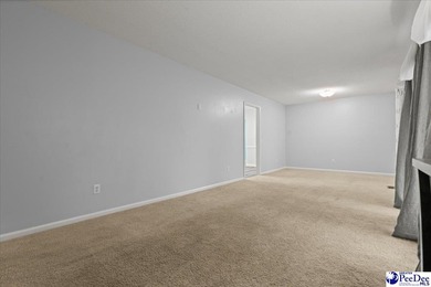 This well-maintained brick ranch home is perfectly situated on on Hartsville Country Club in South Carolina - for sale on GolfHomes.com, golf home, golf lot