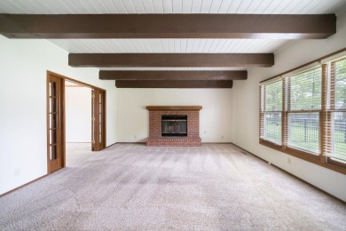 Come tour this spacious 5-bedroom home offering nearly 4,000 sq on Tallgrass Country Club in Kansas - for sale on GolfHomes.com, golf home, golf lot