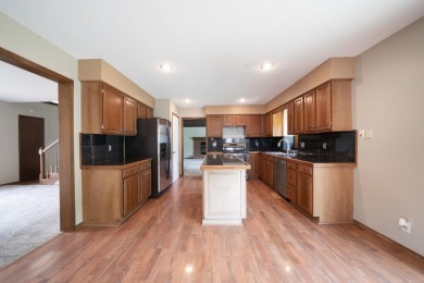 Come tour this spacious 5-bedroom home offering nearly 4,000 sq on Tallgrass Country Club in Kansas - for sale on GolfHomes.com, golf home, golf lot