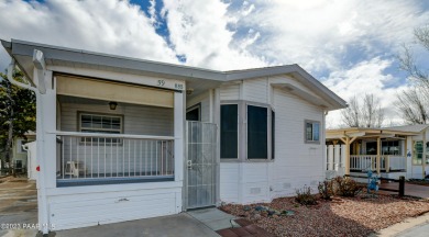 Well maintained and freshly painted, this two bedroom/two bath on Quail Wood Greens Golf Course in Arizona - for sale on GolfHomes.com, golf home, golf lot