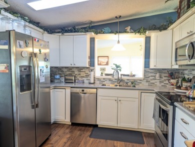 Listed by the Official Sales Team of Cypress Lakes Village on Big Cypress Golf and Country Club in Florida - for sale on GolfHomes.com, golf home, golf lot