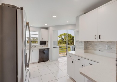 WELCOME TO THIS NATURALLY BRIGHT CONDO WITH EXPANDED SQUARE on Poinciana Golf Club in Florida - for sale on GolfHomes.com, golf home, golf lot