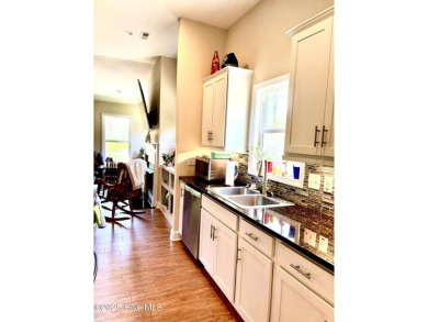 Welcome to your dream home in the gated waterfront community of on Harbour Point Golf Club in North Carolina - for sale on GolfHomes.com, golf home, golf lot