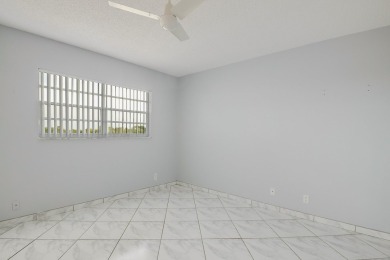 WELCOME TO THIS NATURALLY BRIGHT CONDO WITH EXPANDED SQUARE on Poinciana Golf Club in Florida - for sale on GolfHomes.com, golf home, golf lot