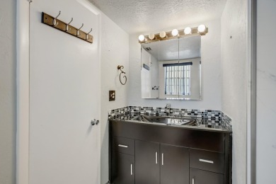WELCOME TO THIS NATURALLY BRIGHT CONDO WITH EXPANDED SQUARE on Poinciana Golf Club in Florida - for sale on GolfHomes.com, golf home, golf lot
