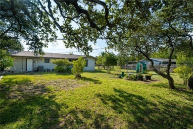 **Location, location, location!** Just two blocks from the on Rockport Country Club in Texas - for sale on GolfHomes.com, golf home, golf lot