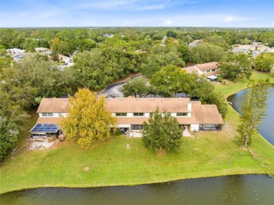 Waterfront Townhome in the Villages at Deer Run! Conveniently on The Country Club At Deer Run in Florida - for sale on GolfHomes.com, golf home, golf lot