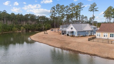 Experience luxury lakeside living in this beautifully appointed on Carolina Colours Golf Club in North Carolina - for sale on GolfHomes.com, golf home, golf lot