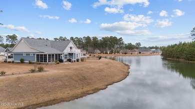 Experience luxury lakeside living in this beautifully appointed on Carolina Colours Golf Club in North Carolina - for sale on GolfHomes.com, golf home, golf lot