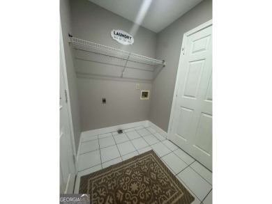 This multi level, multi generational home, has 6 br 3ba home on Fairfield Plantation Golf and Country Club in Georgia - for sale on GolfHomes.com, golf home, golf lot