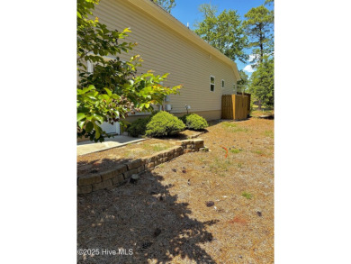 Welcome to your dream home in the gated waterfront community of on Harbour Point Golf Club in North Carolina - for sale on GolfHomes.com, golf home, golf lot