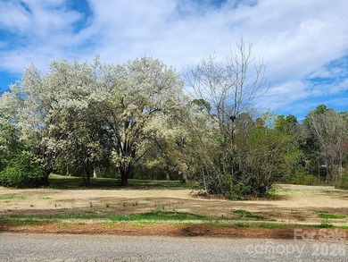 Come discover a large, beautiful mostly cleared .99 acre lot in on Rock Hill Country Club in South Carolina - for sale on GolfHomes.com, golf home, golf lot
