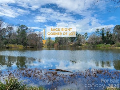 Come discover a large, beautiful mostly cleared .99 acre lot in on Rock Hill Country Club in South Carolina - for sale on GolfHomes.com, golf home, golf lot
