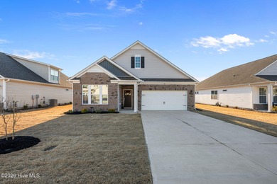 Welcome to 5016 Cinnamon Run in the sought after Carolina on Carolina Colours Golf Club in North Carolina - for sale on GolfHomes.com, golf home, golf lot