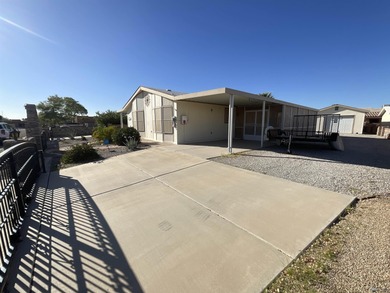 Spacious Foothills home offering room to live, park, and enjoy! on Foothills Executive Golf Course in Arizona - for sale on GolfHomes.com, golf home, golf lot