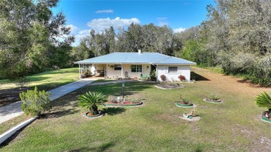 Nestled on a spacious half-acre lot in the desirable Indian Lake on Indian Lake Estates Golf and Country Club in Florida - for sale on GolfHomes.com, golf home, golf lot