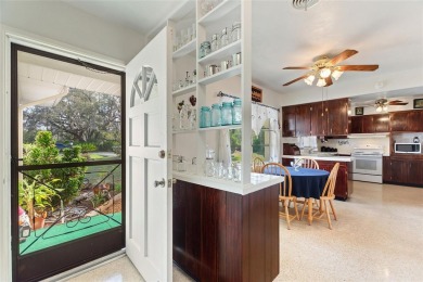 Nestled on a spacious half-acre lot in the desirable Indian Lake on Indian Lake Estates Golf and Country Club in Florida - for sale on GolfHomes.com, golf home, golf lot