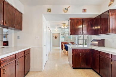 Nestled on a spacious half-acre lot in the desirable Indian Lake on Indian Lake Estates Golf and Country Club in Florida - for sale on GolfHomes.com, golf home, golf lot