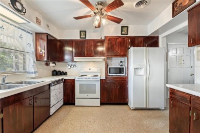 Nestled on a spacious half-acre lot in the desirable Indian Lake on Indian Lake Estates Golf and Country Club in Florida - for sale on GolfHomes.com, golf home, golf lot