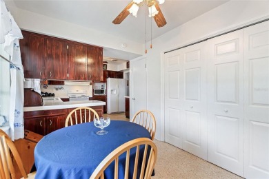 Nestled on a spacious half-acre lot in the desirable Indian Lake on Indian Lake Estates Golf and Country Club in Florida - for sale on GolfHomes.com, golf home, golf lot