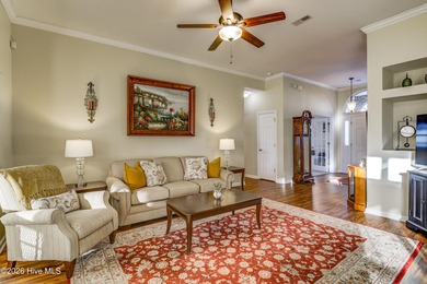 Golf-front living, sunset views, and coastal convenience-this on Meadowlands Golf Club in North Carolina - for sale on GolfHomes.com, golf home, golf lot