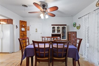 Nestled on a spacious half-acre lot in the desirable Indian Lake on Indian Lake Estates Golf and Country Club in Florida - for sale on GolfHomes.com, golf home, golf lot