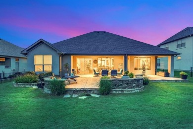 Step into this beautifully appointed two-bedroom, two and a half on Wildhorse Golf Club of Robson Ranch in Texas - for sale on GolfHomes.com, golf home, golf lot