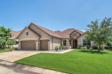 Step into this beautifully appointed two-bedroom, two and a half on Wildhorse Golf Club of Robson Ranch in Texas - for sale on GolfHomes.com, golf home, golf lot