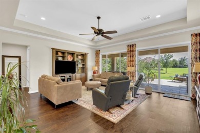 Step into this beautifully appointed two-bedroom, two and a half on Wildhorse Golf Club of Robson Ranch in Texas - for sale on GolfHomes.com, golf home, golf lot