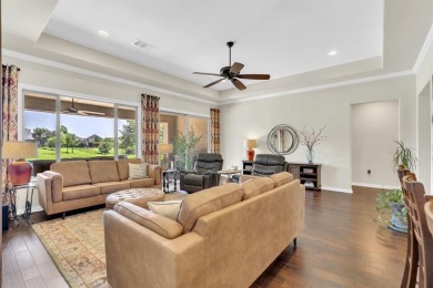 Step into this beautifully appointed two-bedroom, two and a half on Wildhorse Golf Club of Robson Ranch in Texas - for sale on GolfHomes.com, golf home, golf lot