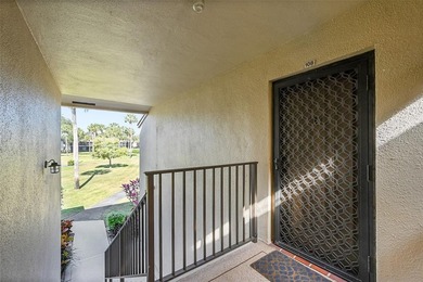 This second-floor unit in Hidden Woods of Deer Creek is a prime on Deer Creek Golf Club in Florida - for sale on GolfHomes.com, golf home, golf lot