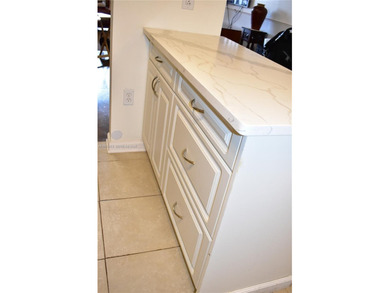 This first floor corner unit is facing the largest lake in on Sunrise Lakes Phase III in Florida - for sale on GolfHomes.com, golf home, golf lot