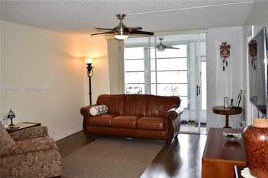 This first floor corner unit is facing the largest lake in on Sunrise Lakes Phase III in Florida - for sale on GolfHomes.com, golf home, golf lot