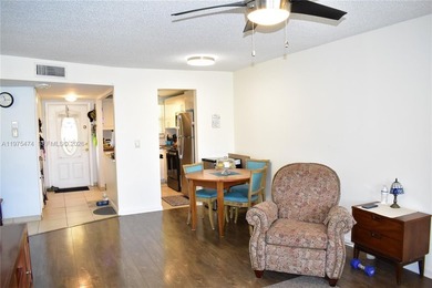 This first floor corner unit is facing the largest lake in on Sunrise Lakes Phase III in Florida - for sale on GolfHomes.com, golf home, golf lot