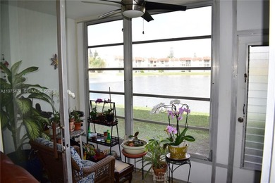 This first floor corner unit is facing the largest lake in on Sunrise Lakes Phase III in Florida - for sale on GolfHomes.com, golf home, golf lot