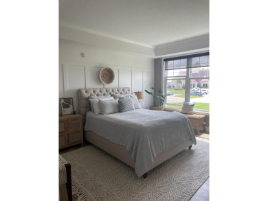 Two bed, two bath, 1,940 sq ft second-floor condo with beautiful on The Macatwa Legends Golf Course in Michigan - for sale on GolfHomes.com, golf home, golf lot