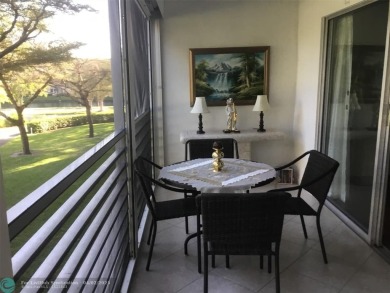***LOVELY 2ND FLOOR UNIT WITH SERENE VIEWS OF GOLF COURSE! on Wynmoor Golf Course in Florida - for sale on GolfHomes.com, golf home, golf lot