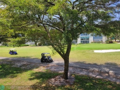 ***LOVELY 2ND FLOOR UNIT WITH SERENE VIEWS OF GOLF COURSE! on Wynmoor Golf Course in Florida - for sale on GolfHomes.com, golf home, golf lot