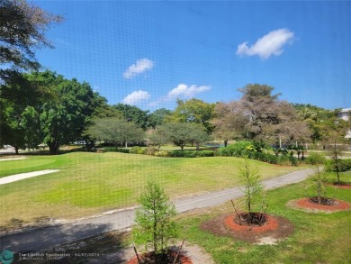 ***LOVELY 2ND FLOOR UNIT WITH SERENE VIEWS OF GOLF COURSE! on Wynmoor Golf Course in Florida - for sale on GolfHomes.com, golf home, golf lot