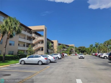 ***LOVELY 2ND FLOOR UNIT WITH SERENE VIEWS OF GOLF COURSE! on Wynmoor Golf Course in Florida - for sale on GolfHomes.com, golf home, golf lot