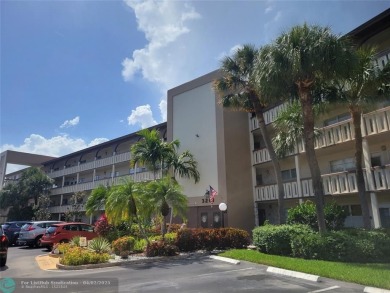 ***LOVELY 2ND FLOOR UNIT WITH SERENE VIEWS OF GOLF COURSE! on Wynmoor Golf Course in Florida - for sale on GolfHomes.com, golf home, golf lot