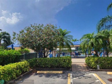 ***LOVELY 2ND FLOOR UNIT WITH SERENE VIEWS OF GOLF COURSE! on Wynmoor Golf Course in Florida - for sale on GolfHomes.com, golf home, golf lot